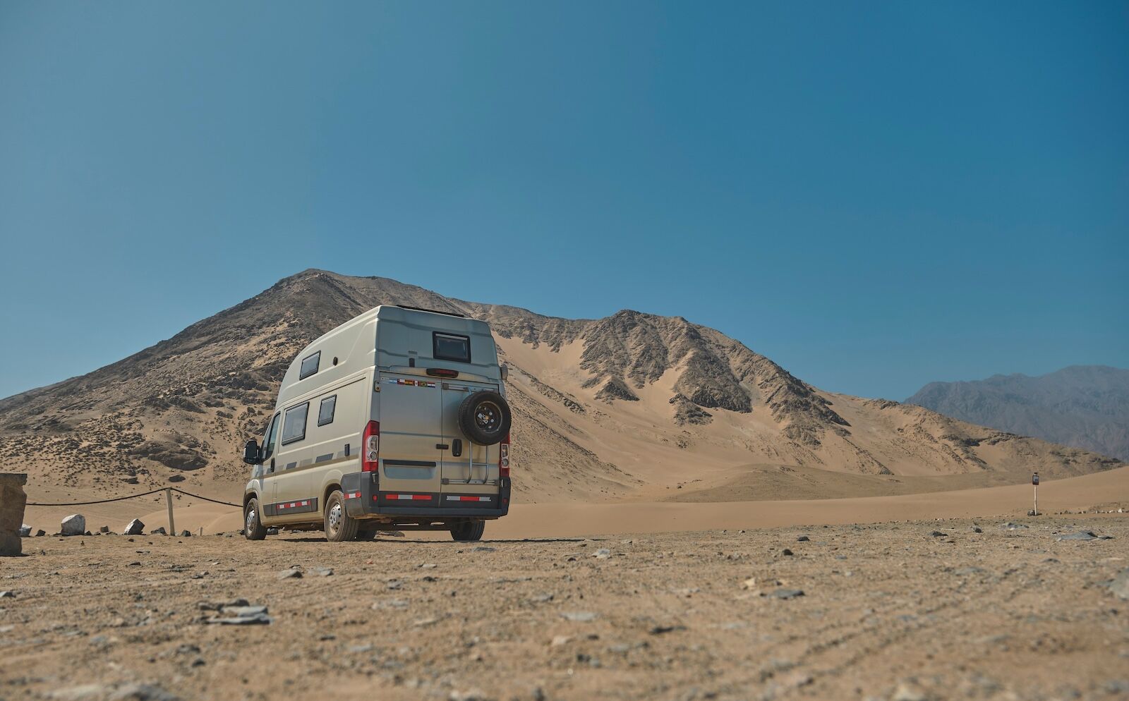 van parked to camp at caral