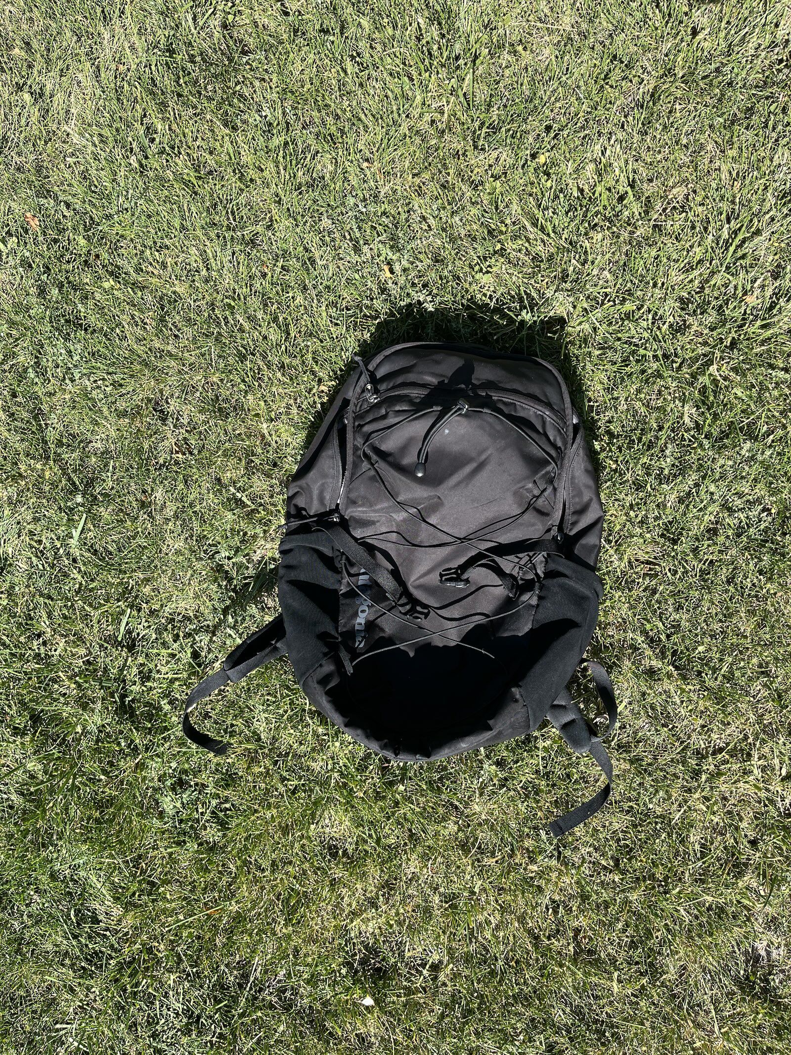 backpack drying in lawn