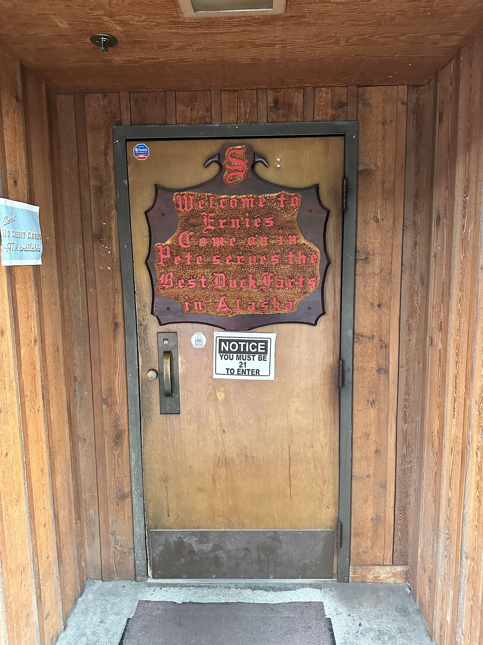 the front door at ernie's bar in sitka, alaska, calls out the duck fart shots