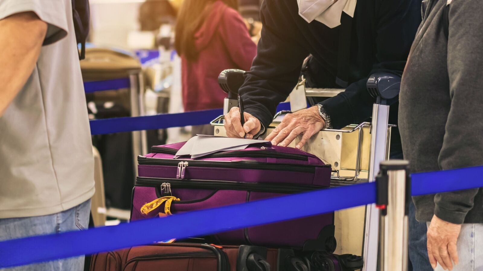 person filling out form - countries open to american travelers 