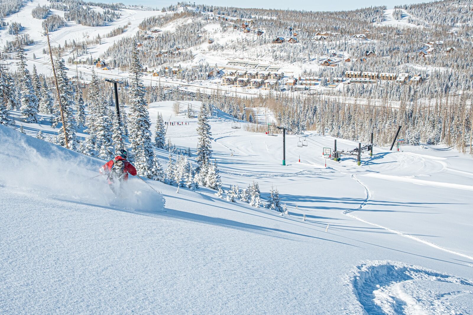 brian head lift ticket - skier on downhill