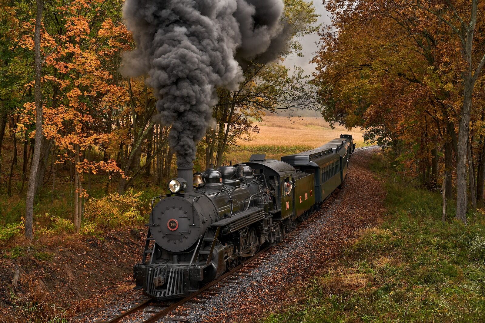 One of the trains of the East Broad Top railroad traversing the beautiful landscape of the Aughwick Valley in Pennsylvania in the fall.