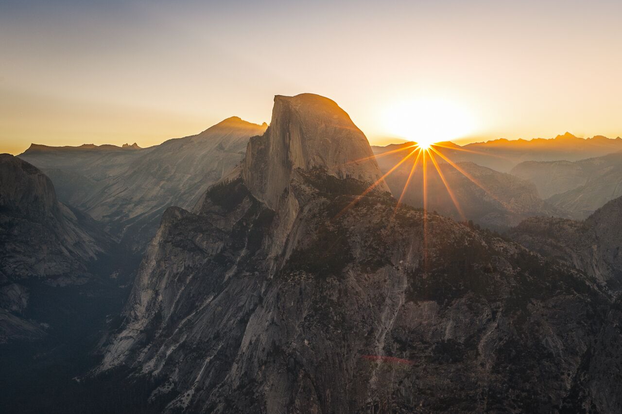 first dawn light in yosemite national park from glacier point with half dome