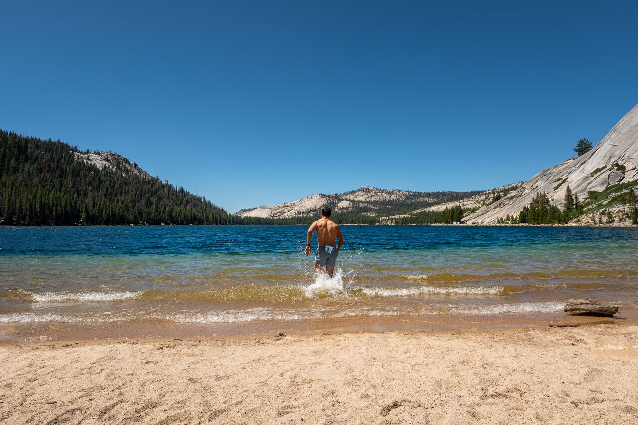 early morning plunge in tenaya lake in yosemite national park