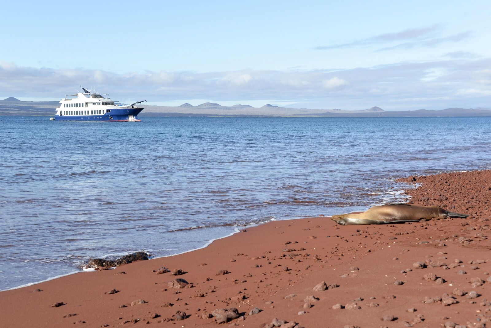 Ecoventura ship anchored near Rabida Island in the Galapagos