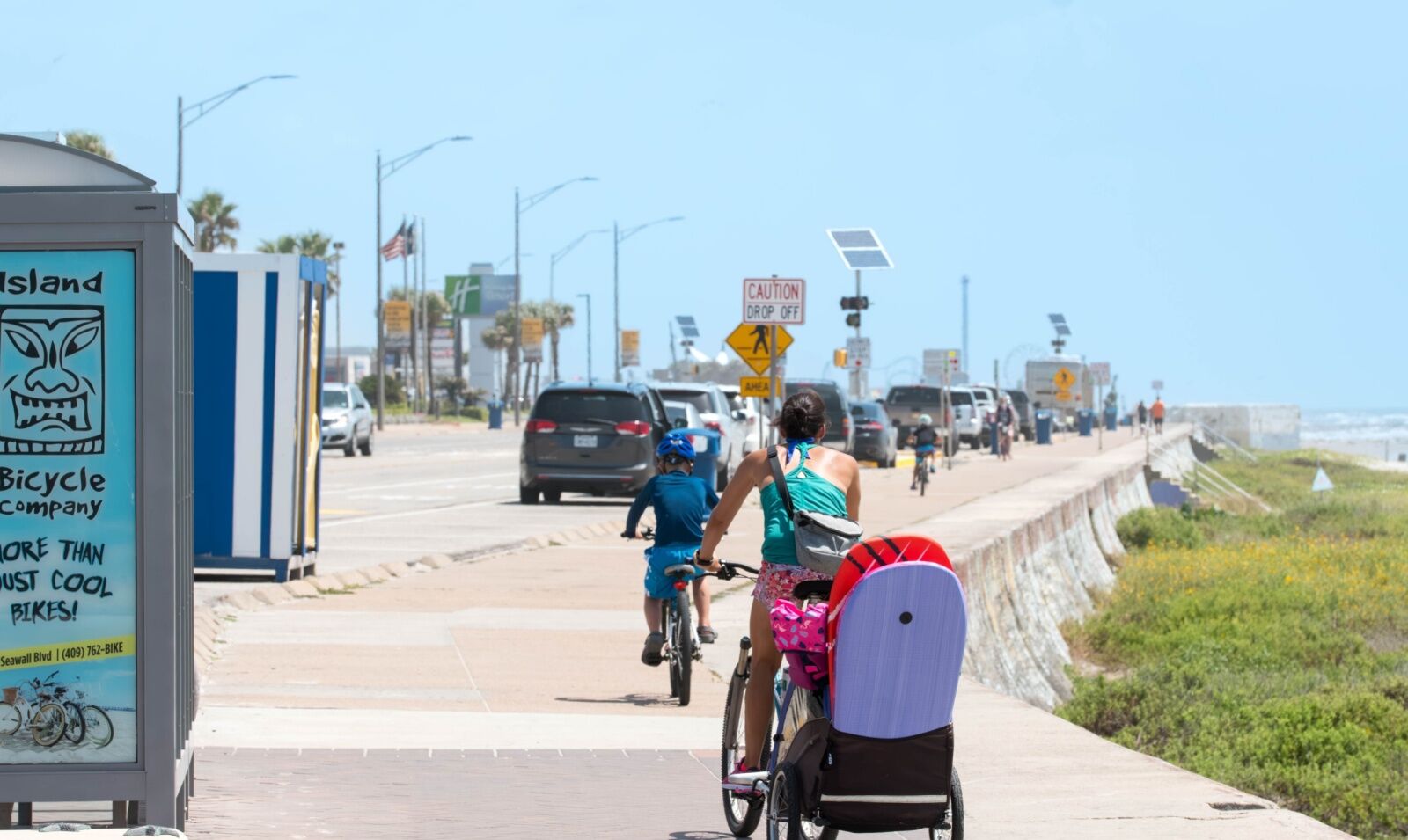 woman on the galveston TX seawall (uluwatu seawall project)