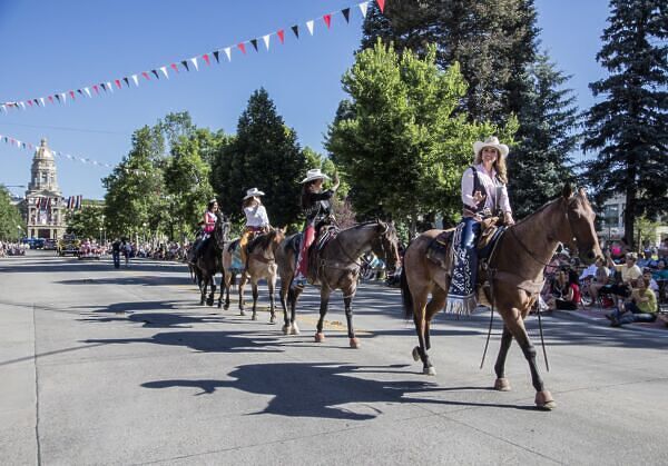 wolf tourism in yellowstone - rancher side - women at frontier days