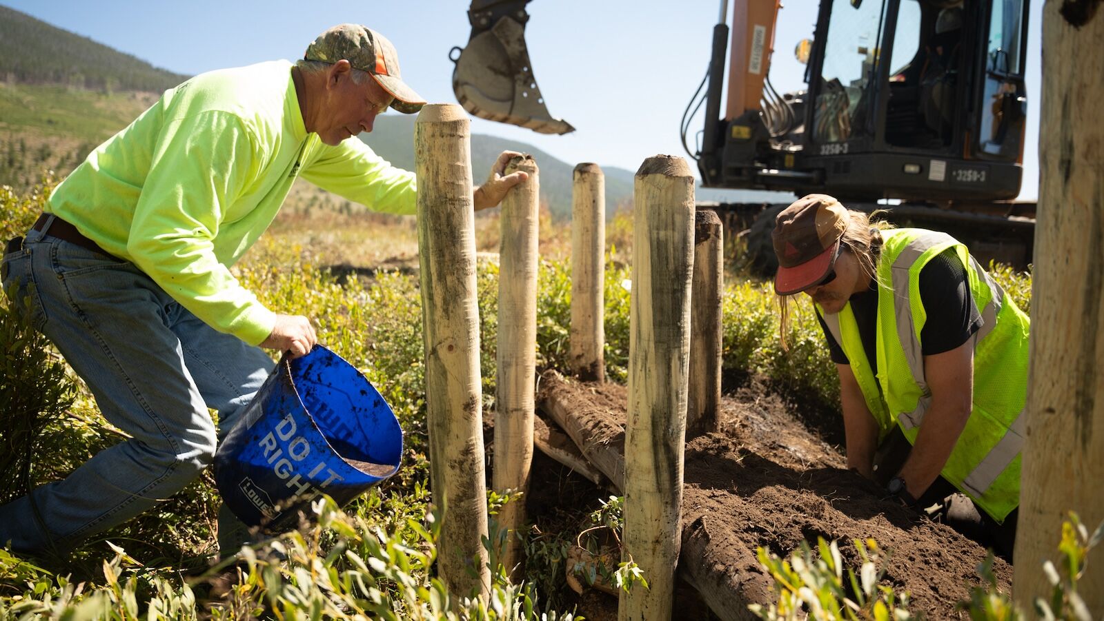 workers at soda creek restoration project