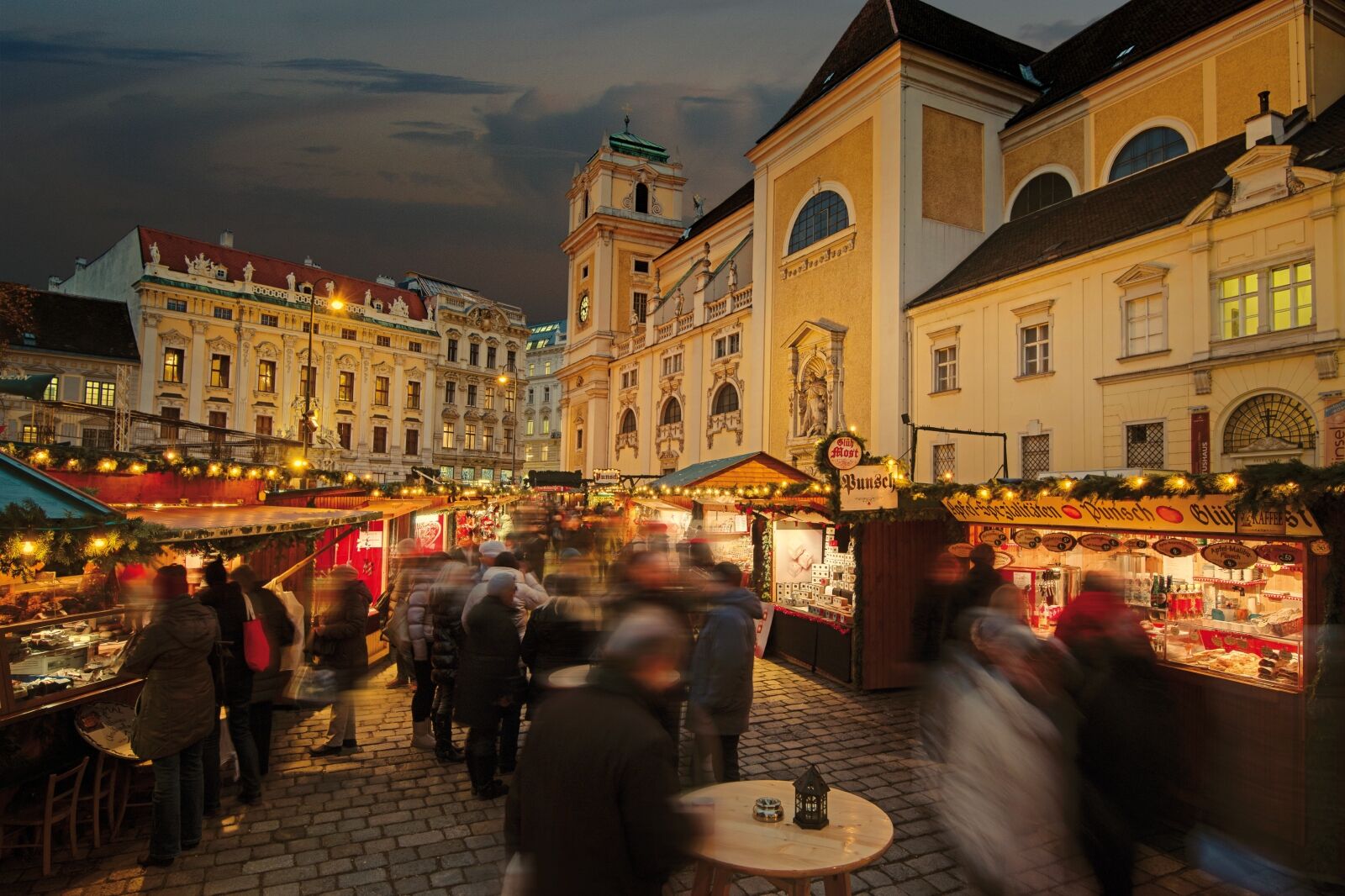 People at Christmas Market at night in Vienna