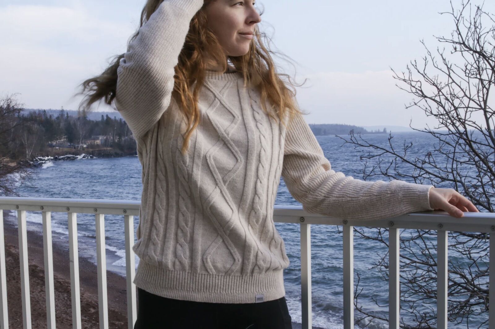 woman in adobe outside sweater