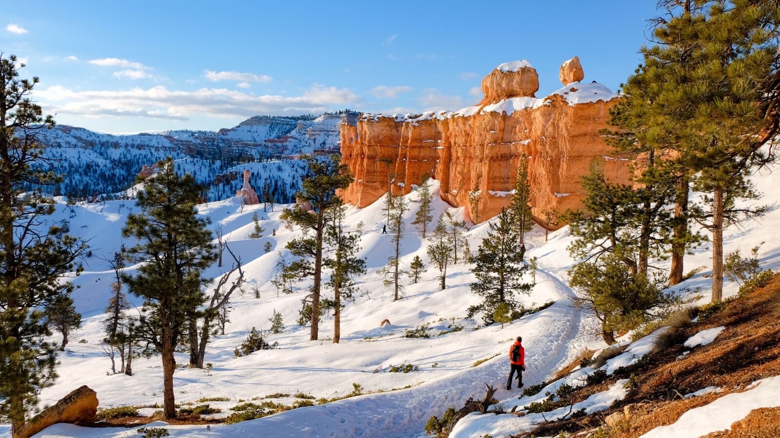 why is overtourism happening - hiker in snow at bryce