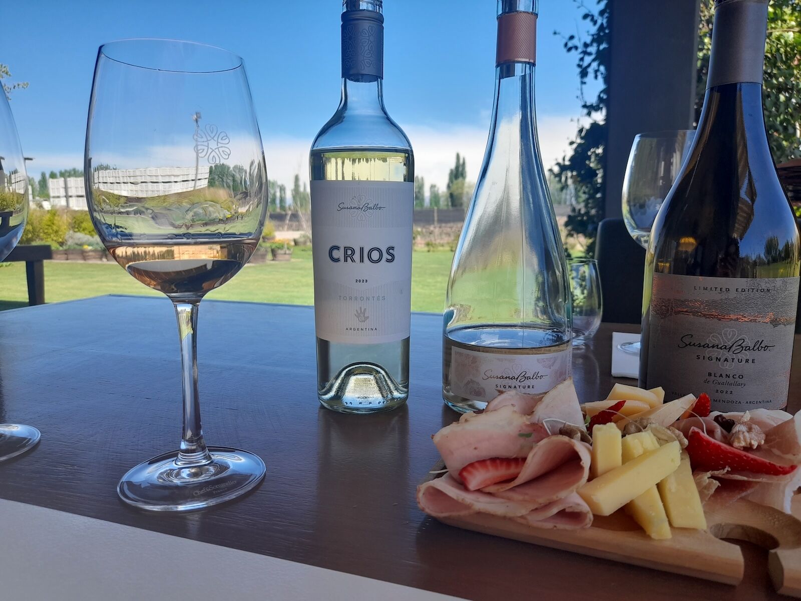 bottles of wine with charcuterie at SB Winemaker's House & Spa Suites