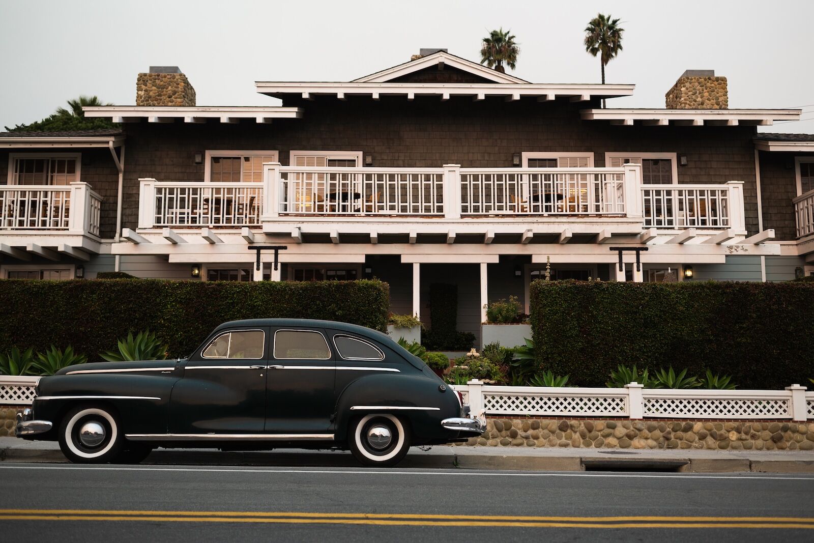 vintage car in front of the inn on summer hill