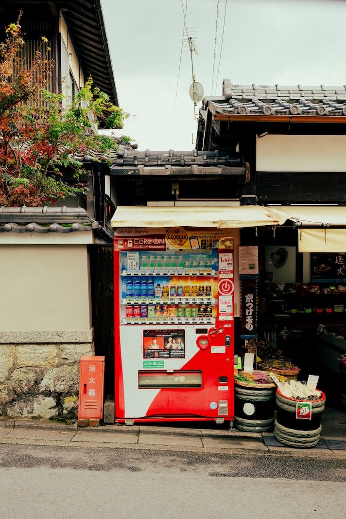 red and white vending machine in japan