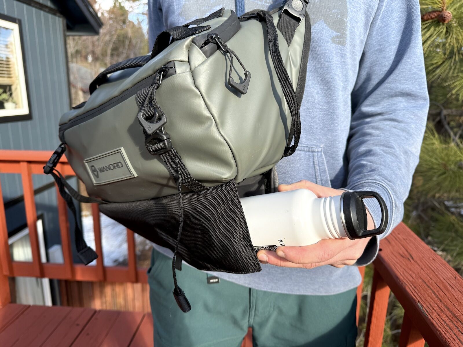 water bottle pocket in use wandrd rogue sling