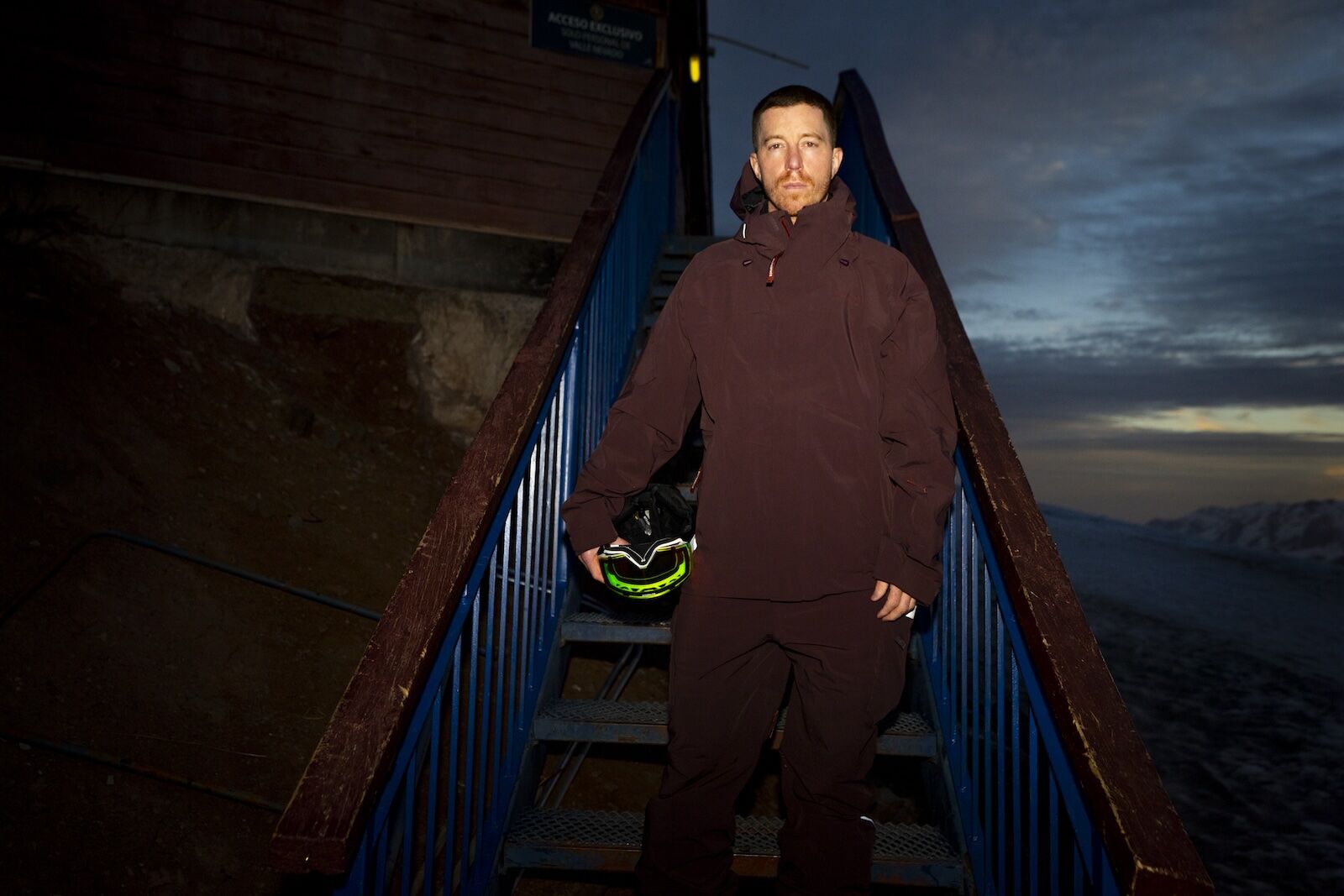 shaun white in snowboard gear on staircase