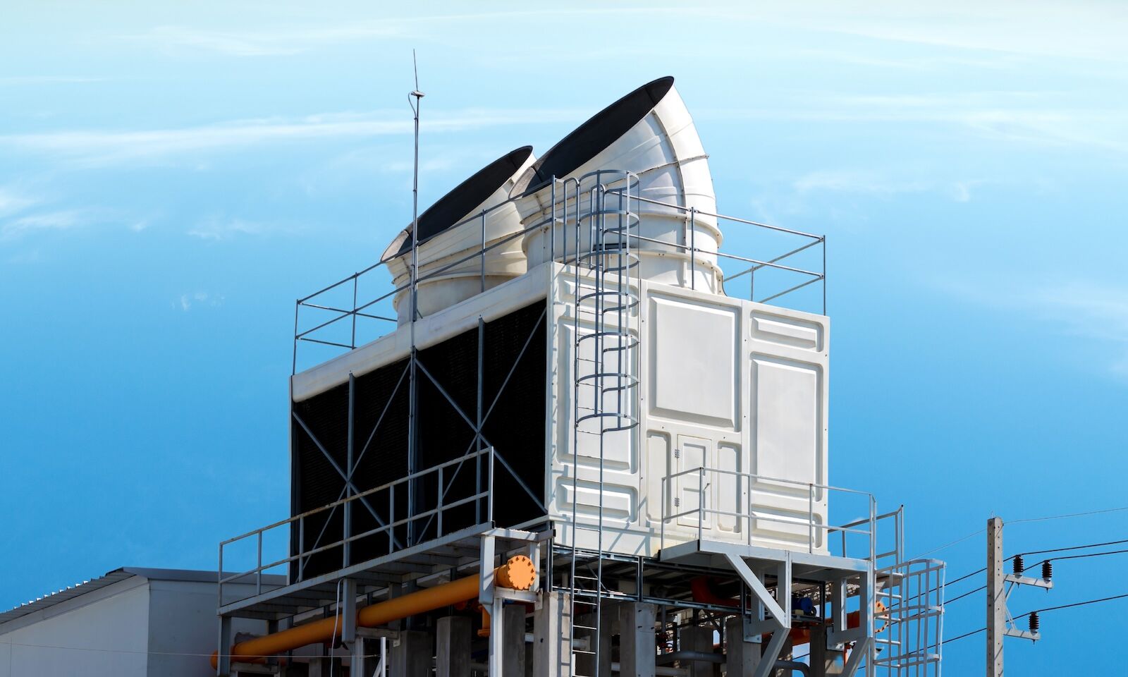 carbon capture device atop industrial facility