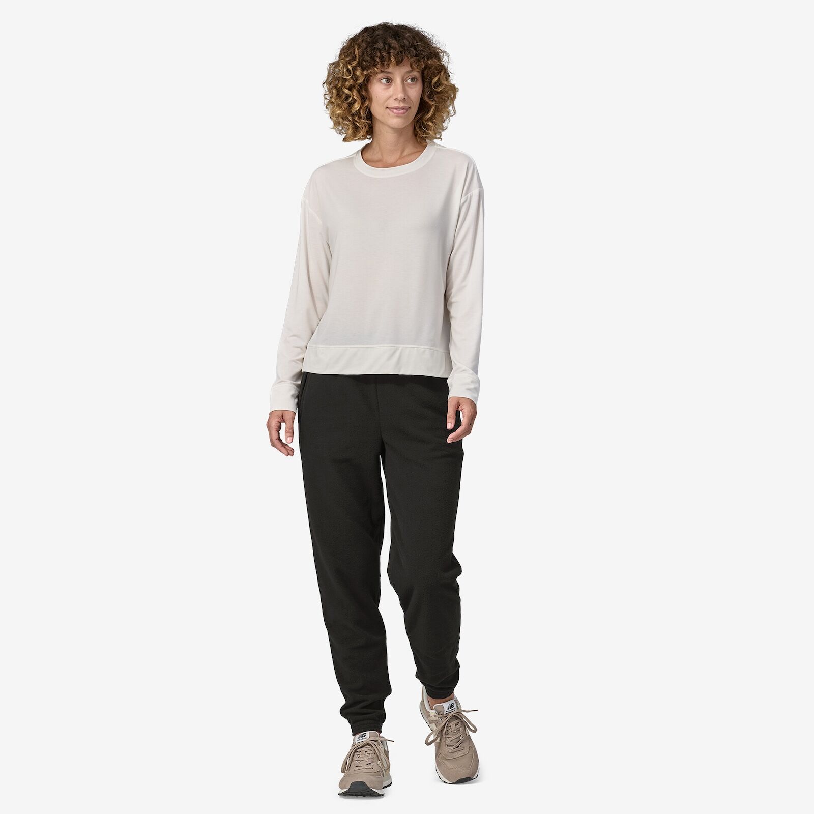 woman in patagonia micro fleece joggers