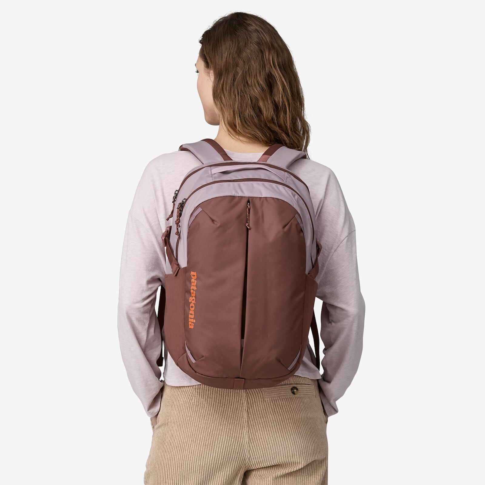 woman wearing patagonia refugio daypack