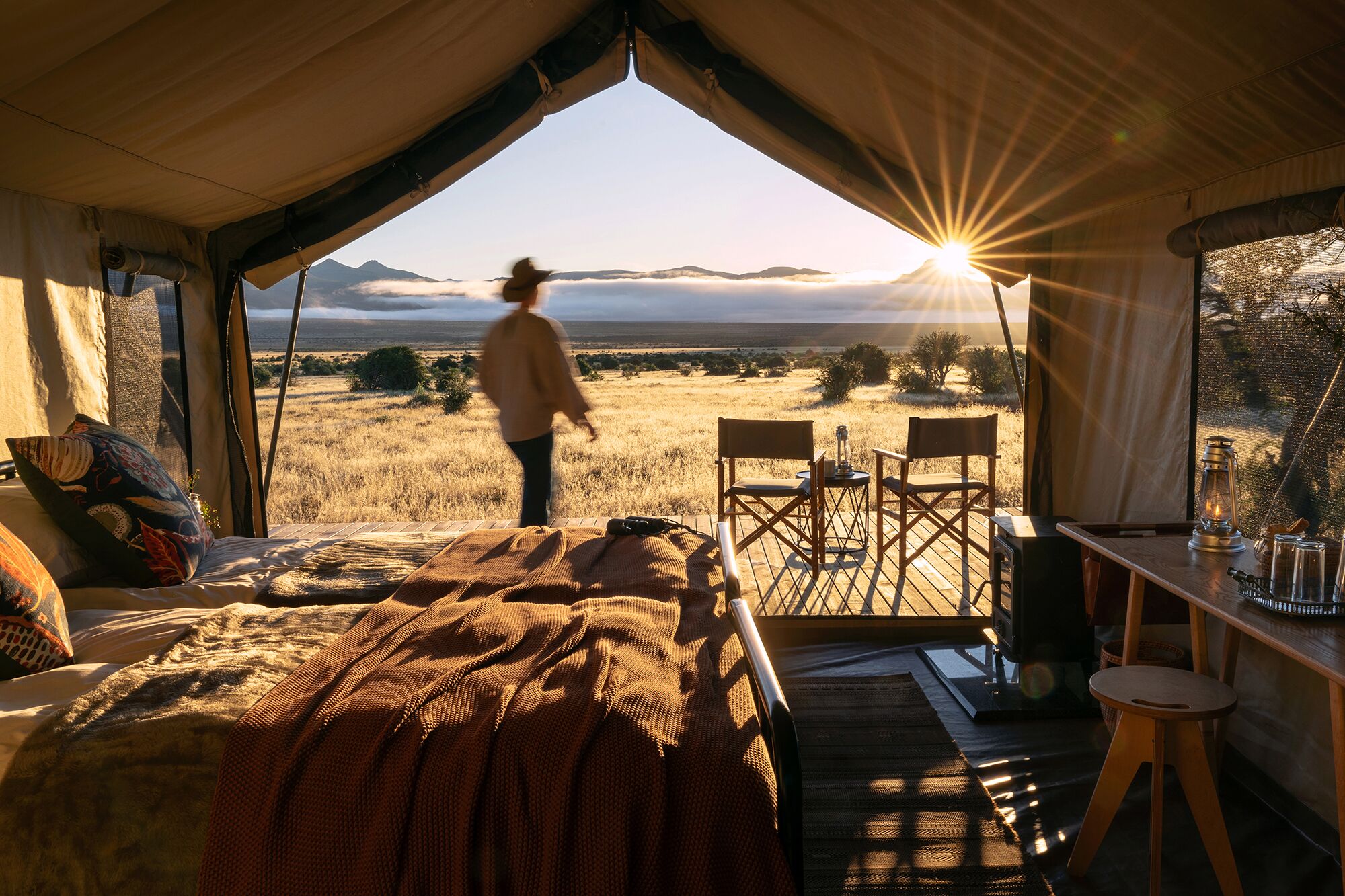 samara reserve tent and person in sunset