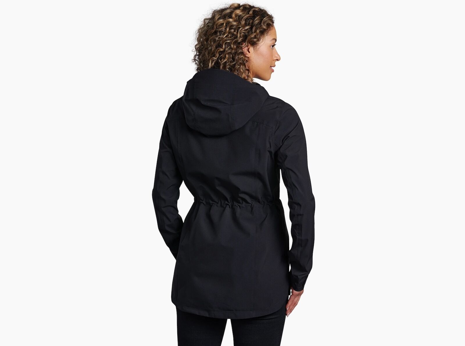 woman facing backward in kuhl stretch voyagr jacket