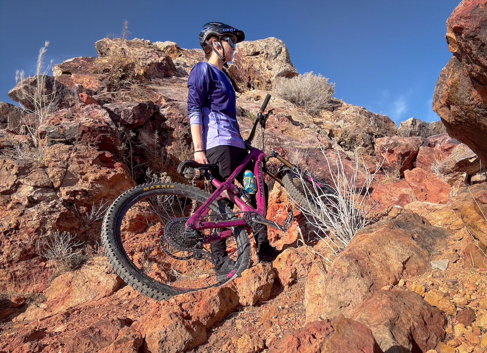 mountain biker in dharco jersey on trail