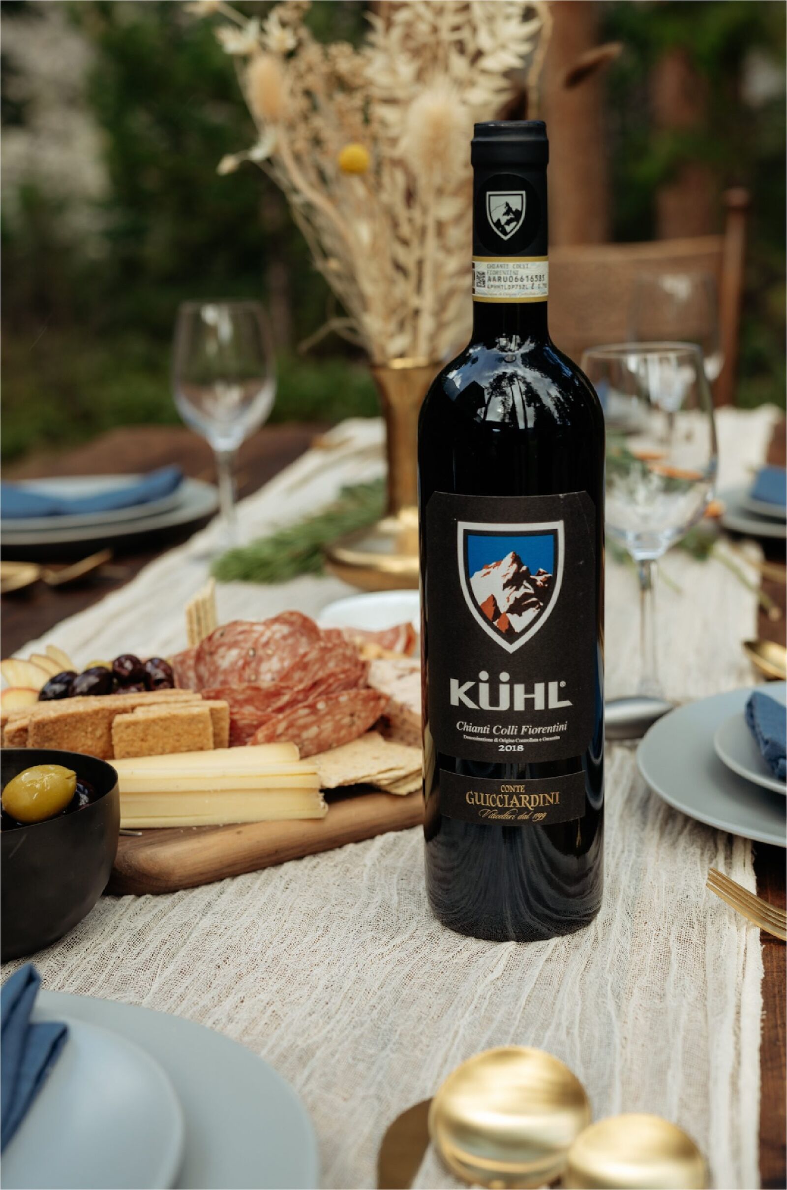 bottle of kuhl wine on charcuterie board