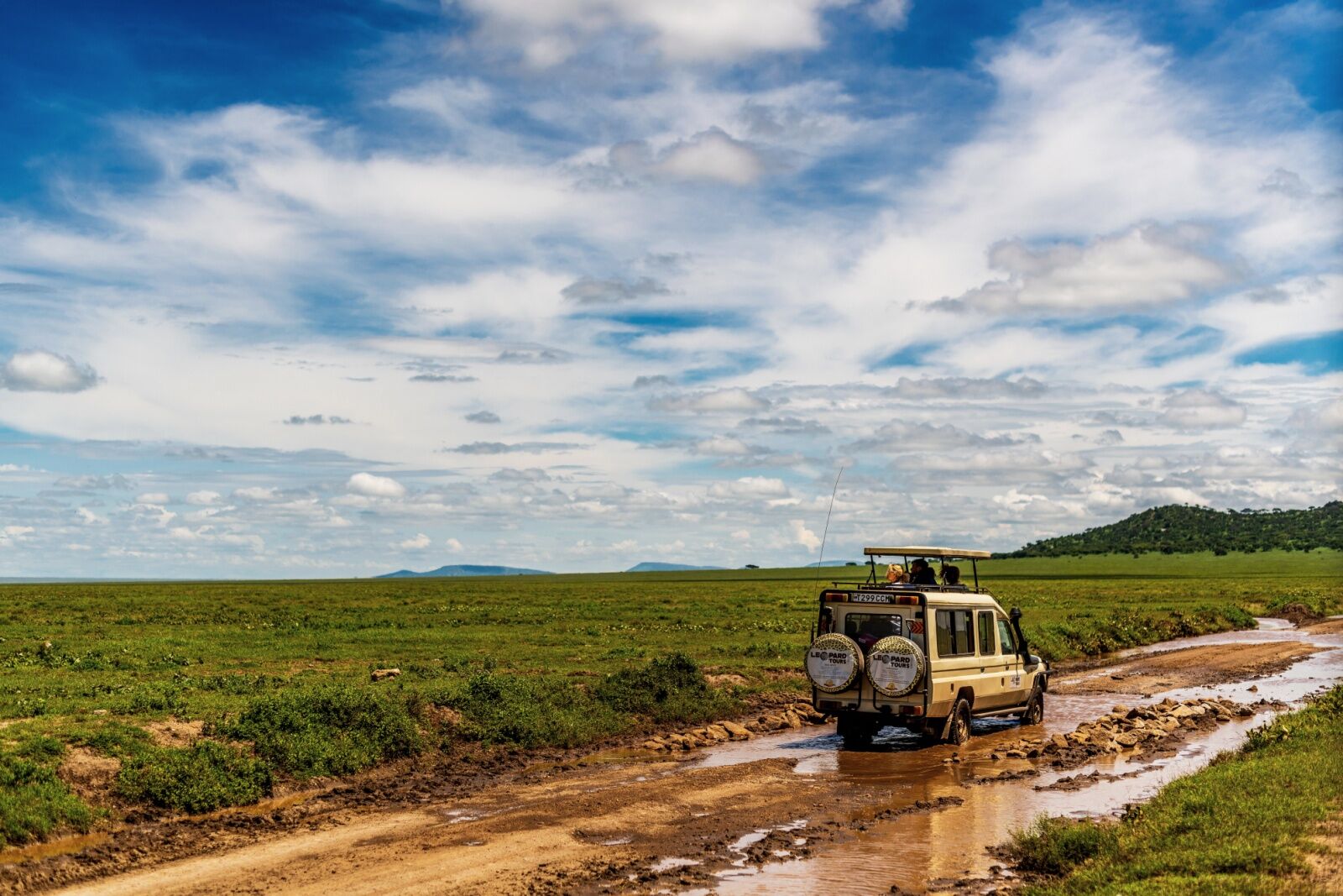 tanzania road trip - muddy road in park