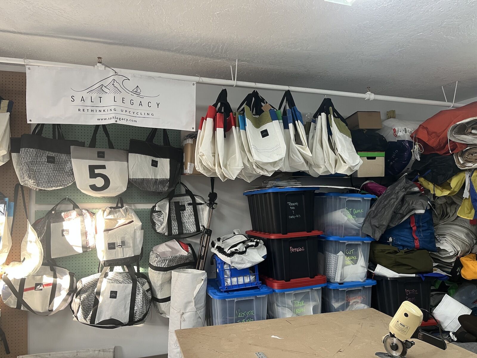 wall of upcycled sailcloth bags at Salt Legacy in Victoria, BC
