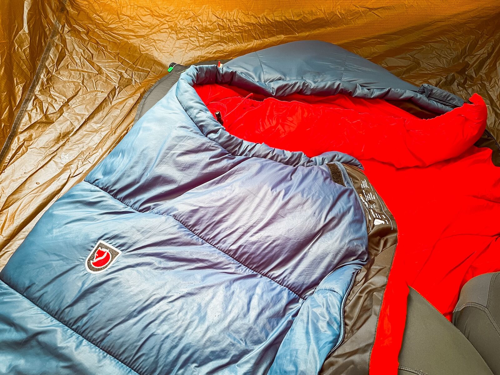 how to stay warm while camping - sleeping bag