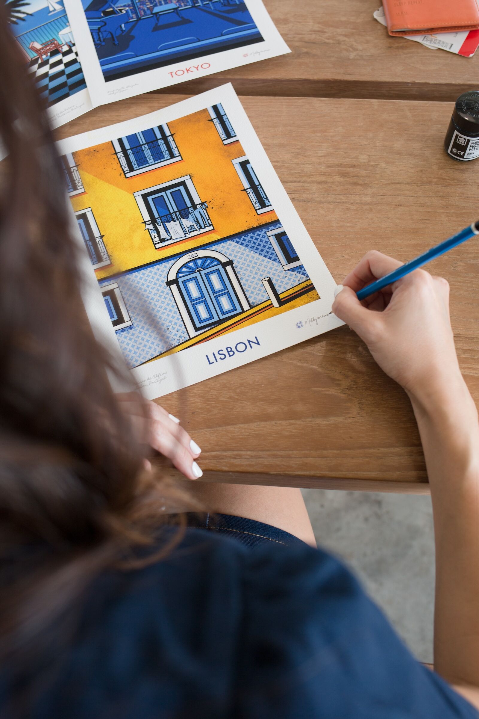 molly maine working on an illustration