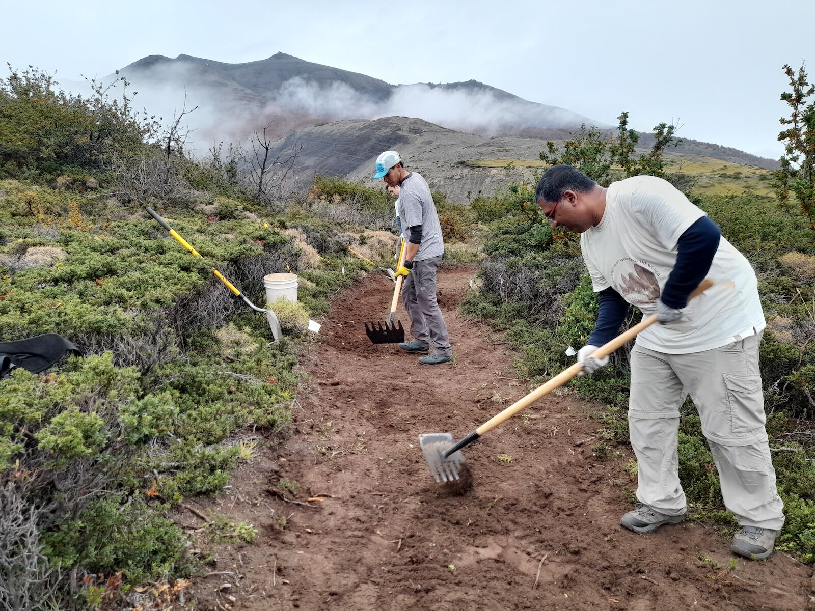 volunteers doing trail maintenance in chilean patagonia