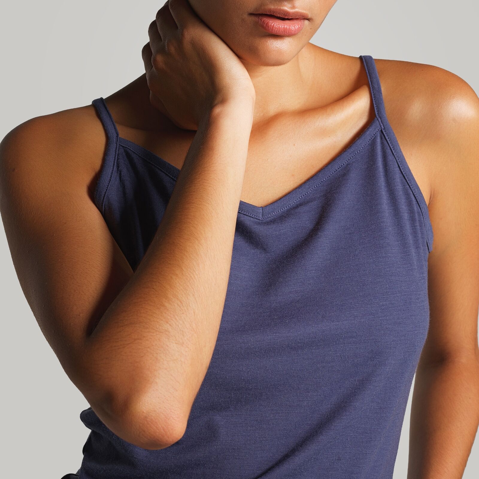 woman in ibex cami shirt