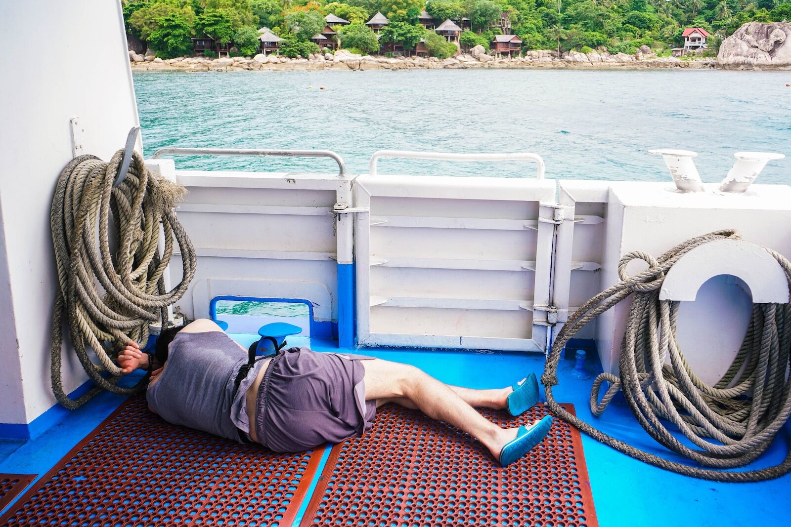 poop cruise - person sick on ship deck