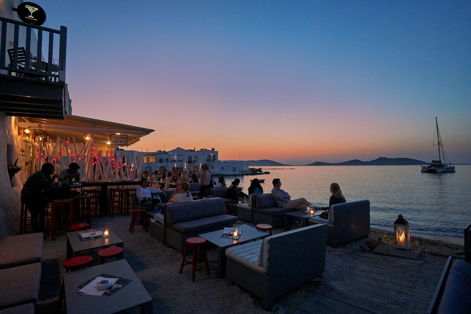 best islands 2025 -  paros greece beachside bar