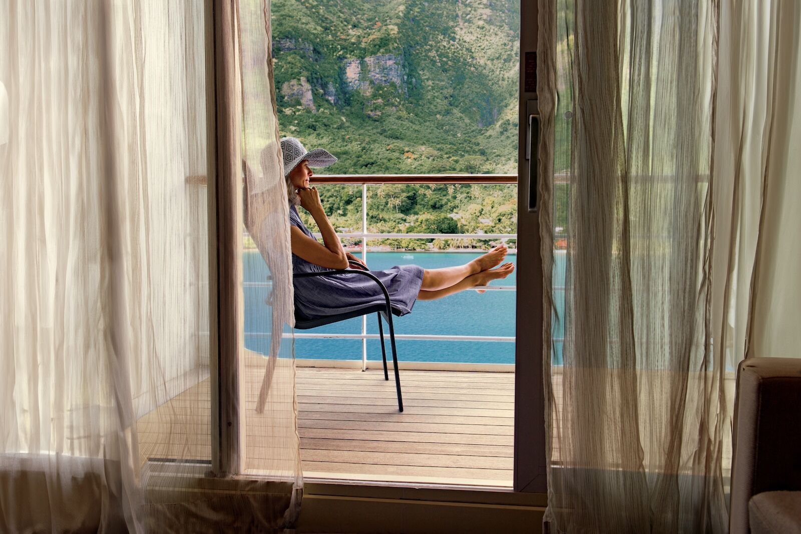 woman on deck of paul gauguin cruise