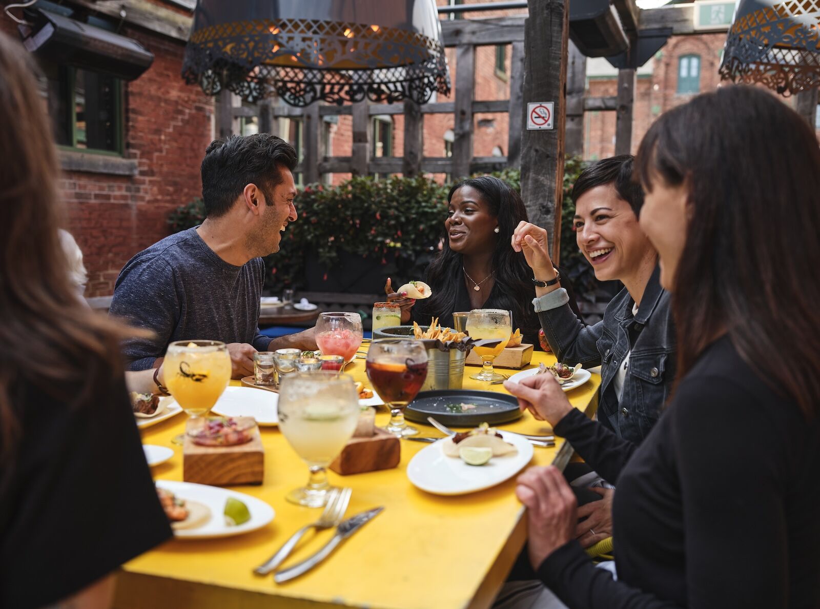 people chatting at a toronto restaurant