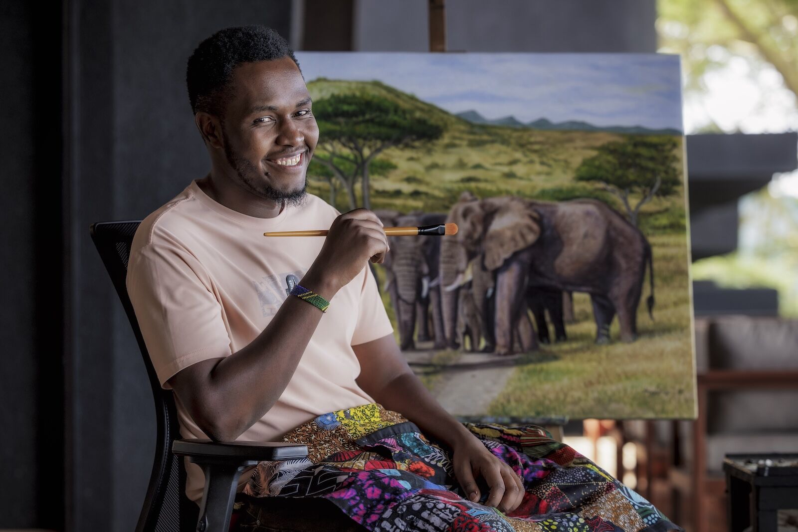 artist at work at the lodge - explorer lodge tanzania