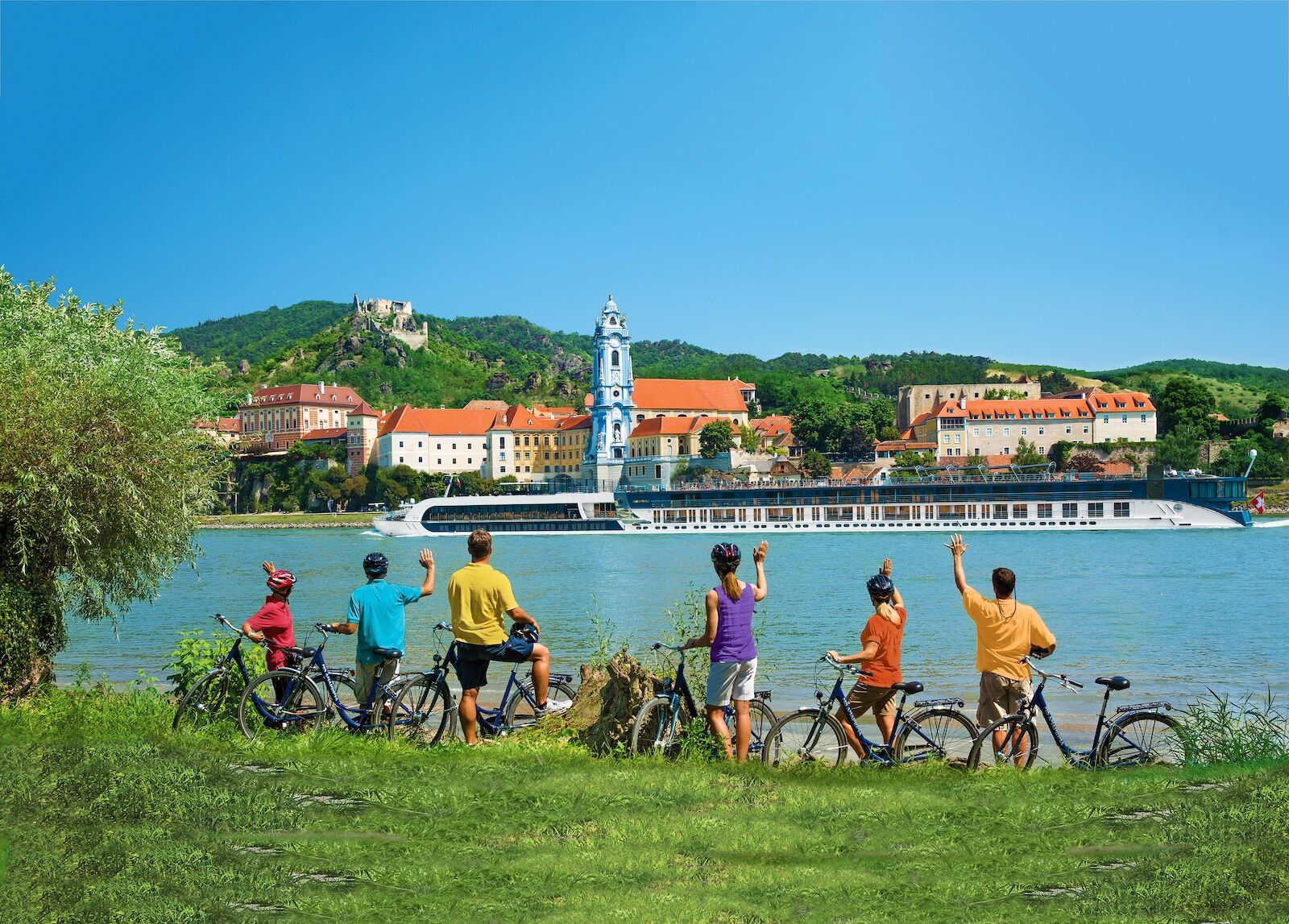 wellness cruises - people waving at ship