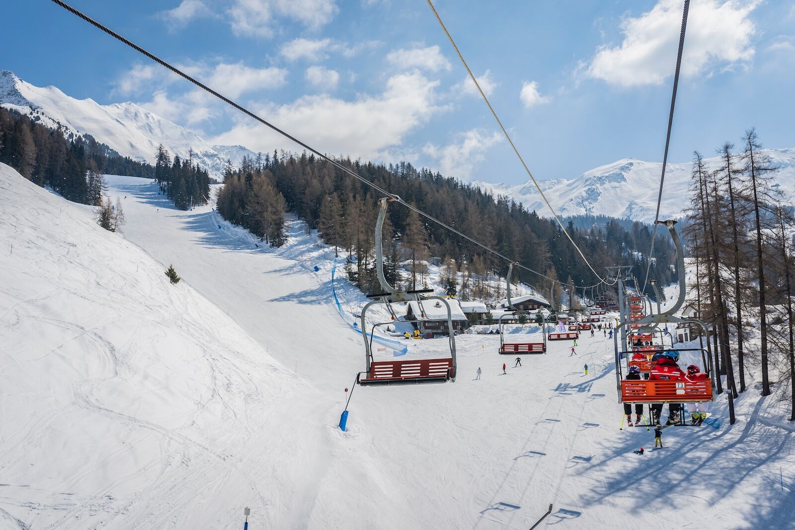 skiers on slope in pila italy