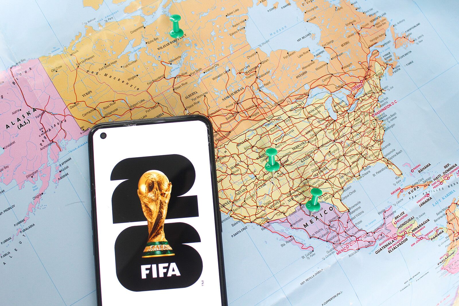 how to get world cup tickets - map and fifa logo on phone