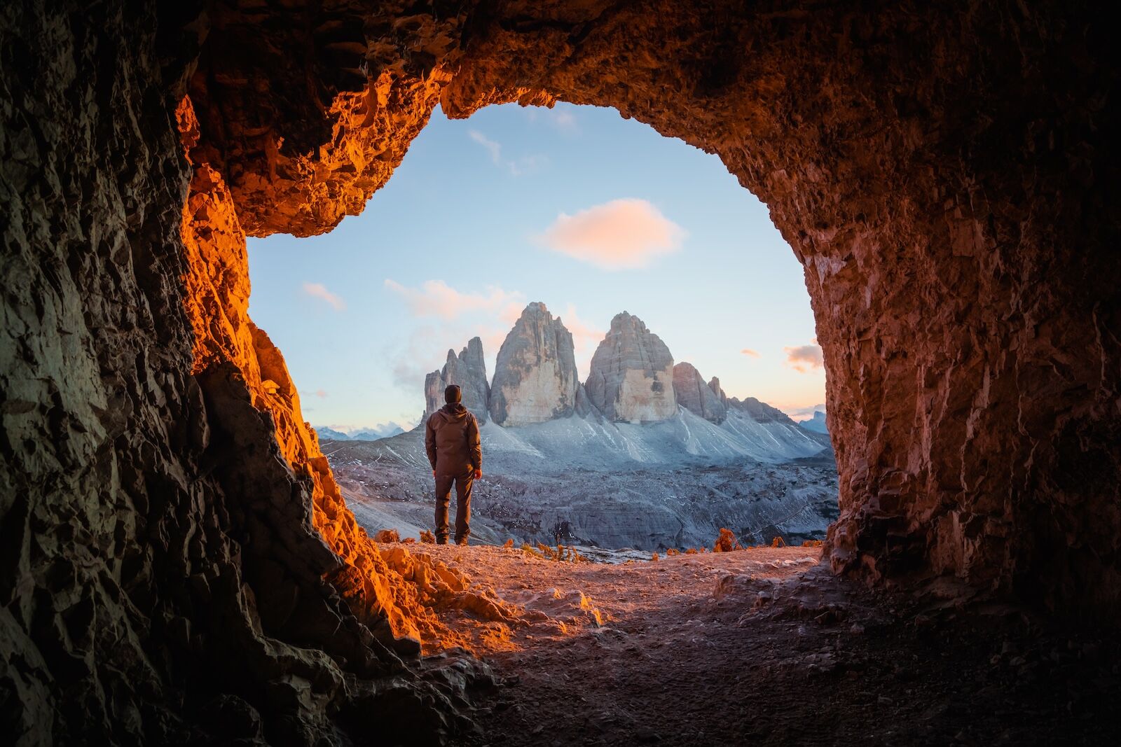man in patagonia looking at peaks