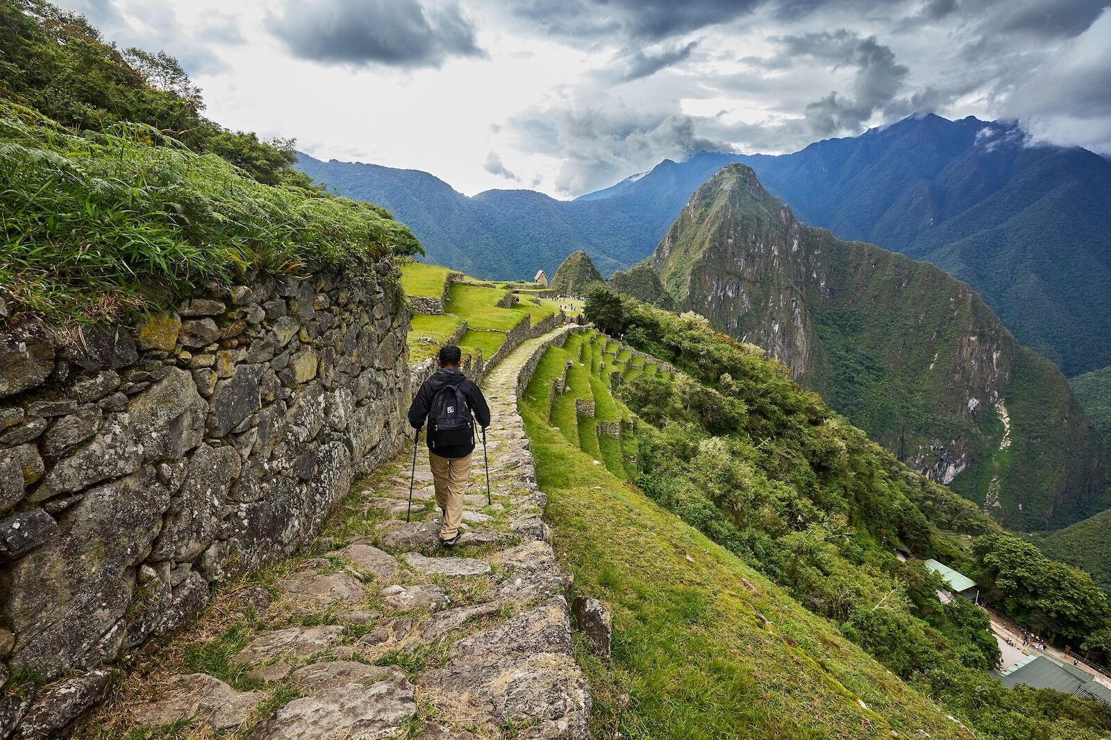 trekker approaching machu picchu
