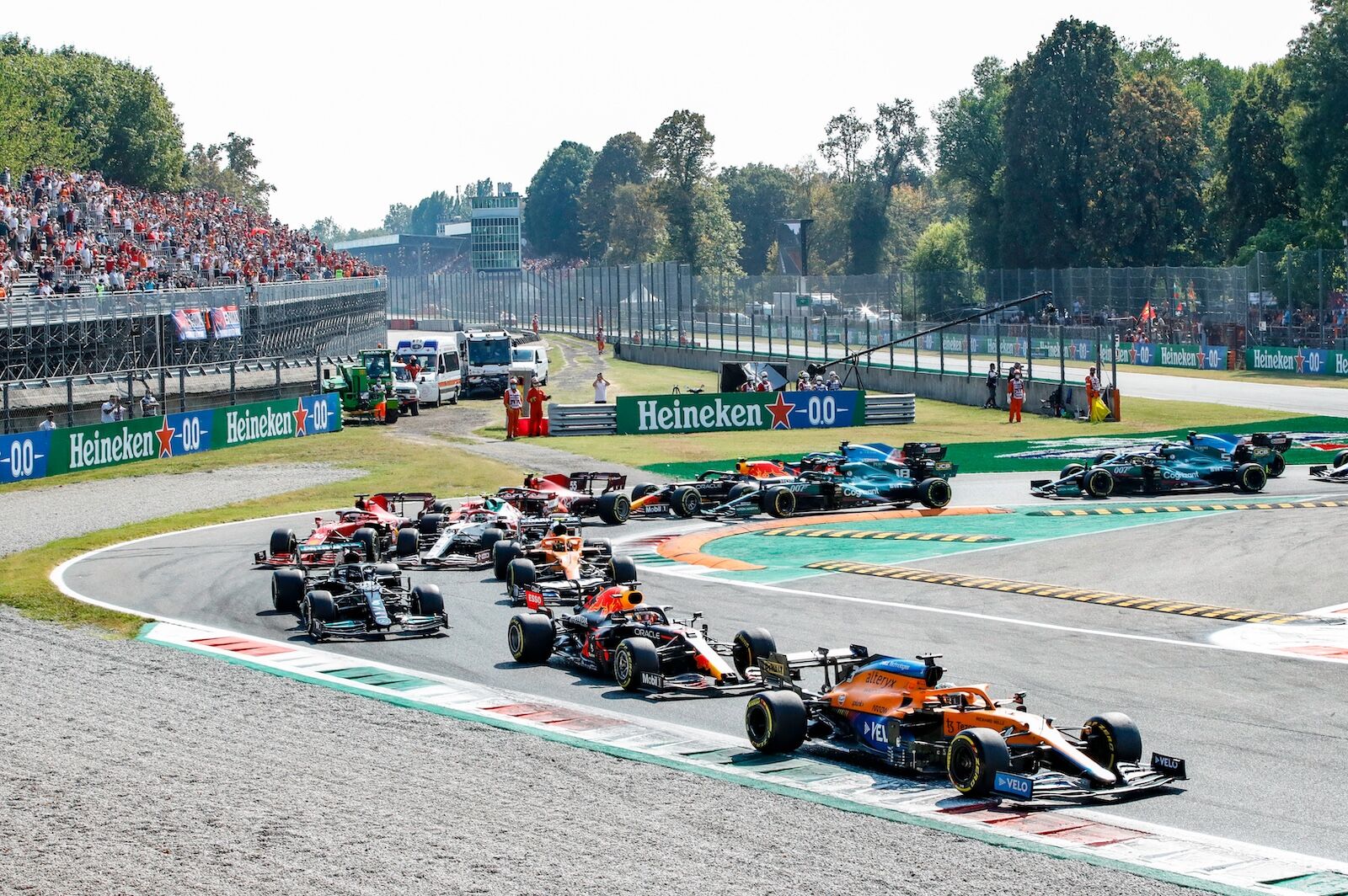 Monza, Italy. 12 September 2021. F1 World Championship. Heineken Italian Gran Prix. Race day. Daniel Ricciardo, Mclaren, leads the group of cars at the Start of the Race.