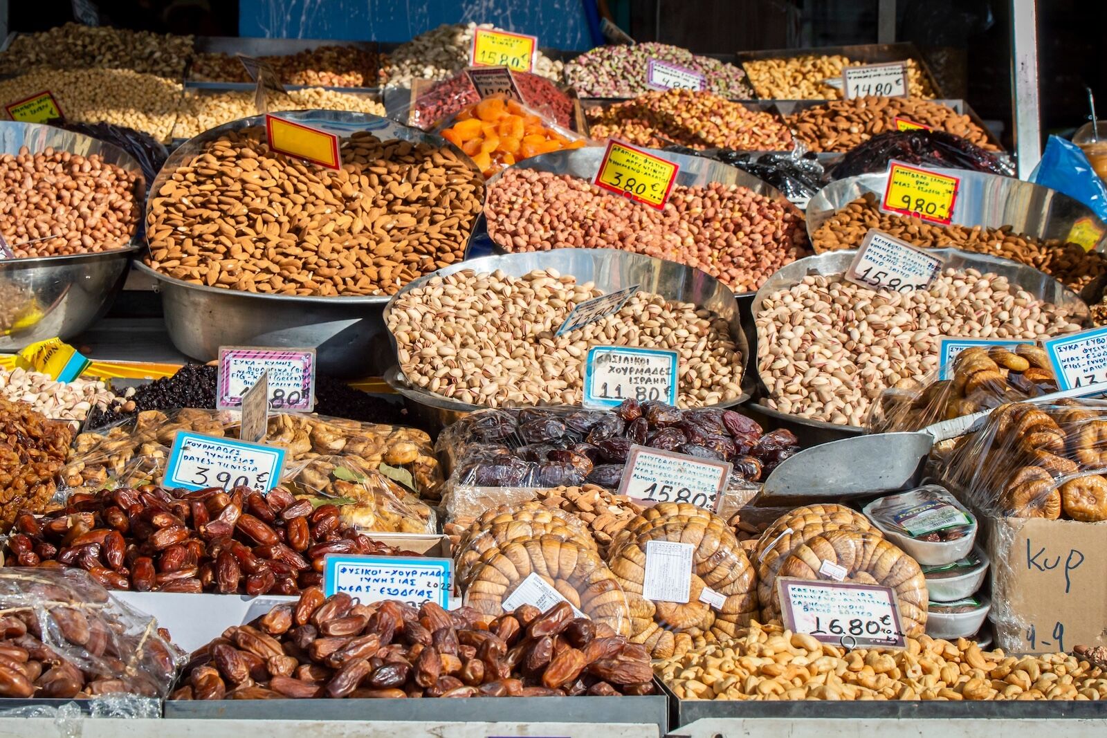 Athens, Greece, Oct. 7th, 2022. View of variety of nuts and dried fruits with price tags at Athens Varvakios Central Municipal Market.