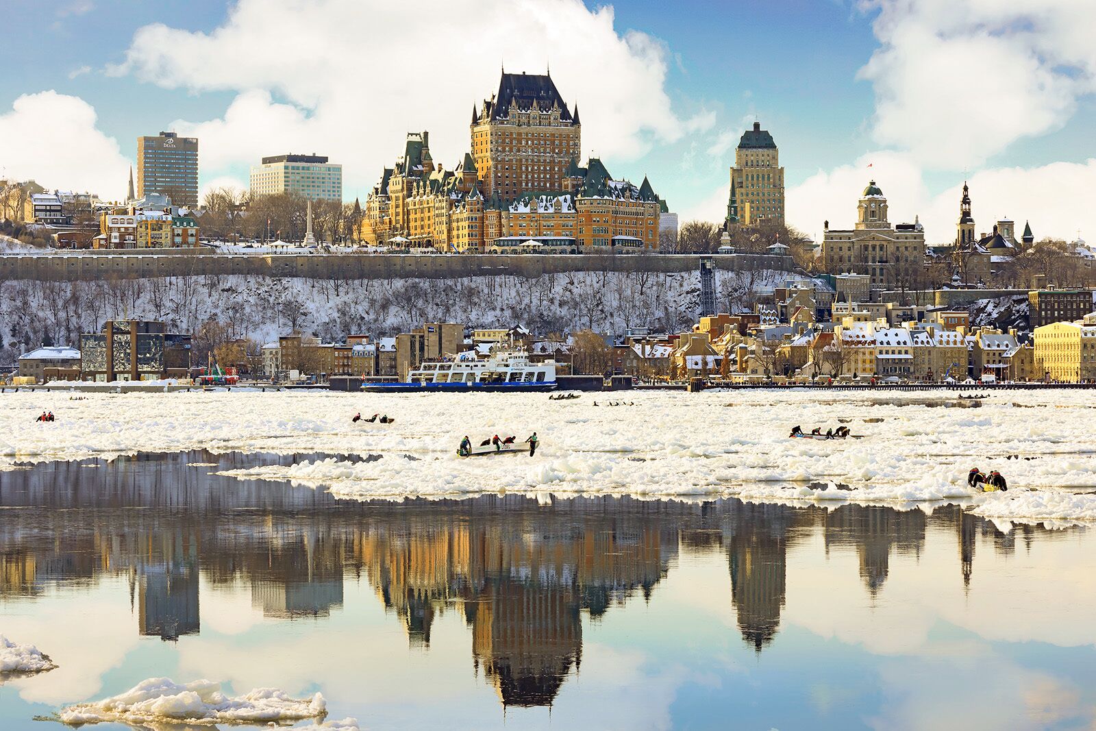 ice canoeing with quebec in the background