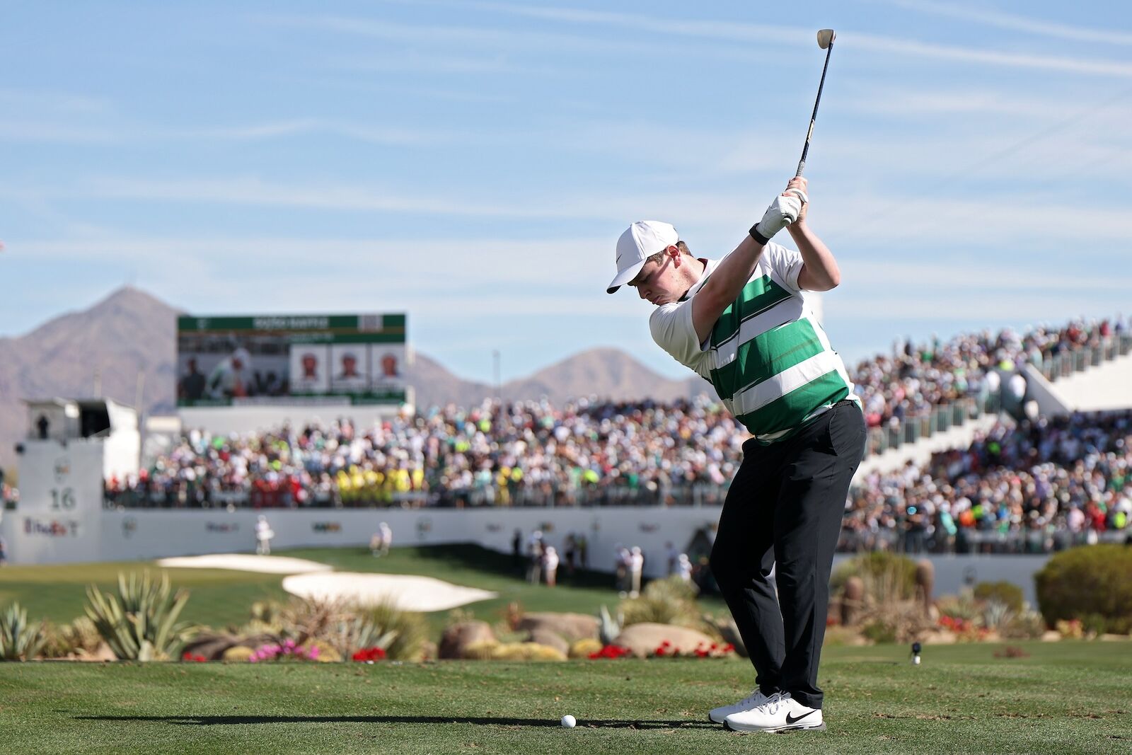 golfer on green at 16th hole