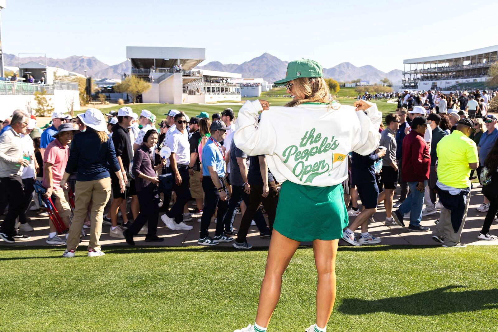 woman wearing the people's tournament sweatshirt