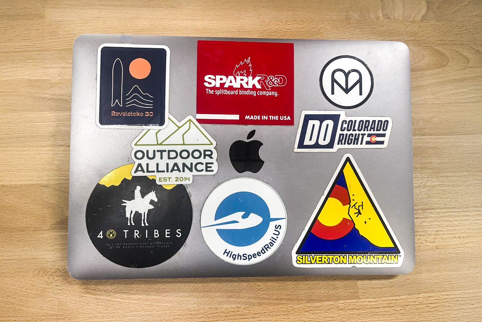 MacBook Pro covered with stickers