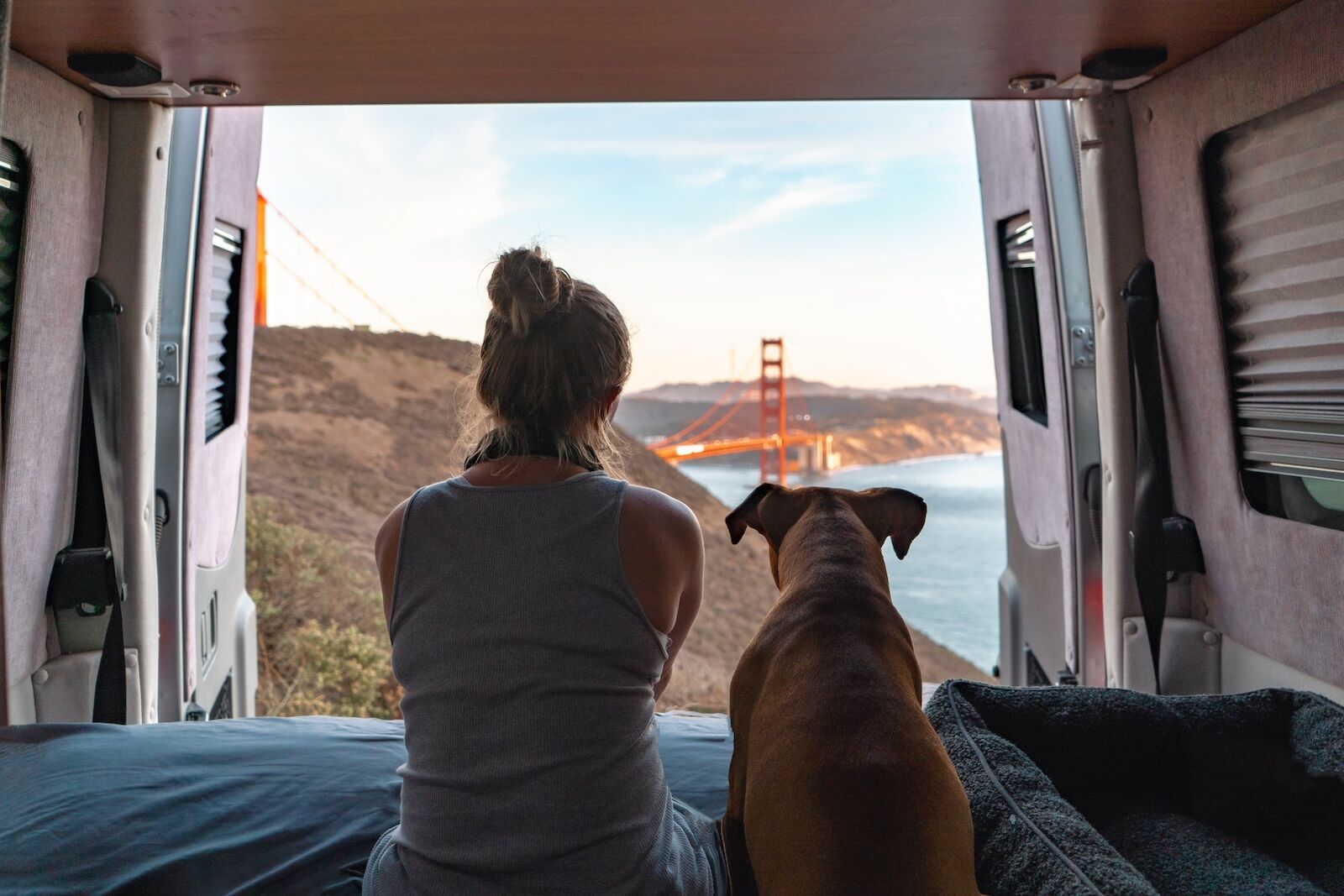 world cup by RV - woman and dog looking at golden gate in SF